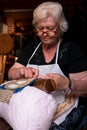 The centuries-old craftsmanship needle lace of Burano. Royalty Free Stock Photo