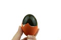 Century egg or preserved egg is eggs that are soaked in quicklime which turns the albumen green