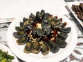 Century or thousand year sliced eggs on serving dish surrounded by other dishes