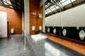 Ceramic bathroom sink in men`s bathroom