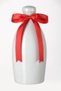 Ceramic bottle with red riband Royalty Free Stock Photo