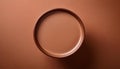 Ceramic bowl of chocolate milk on brown textured surface, mocha mousse color Royalty Free Stock Photo