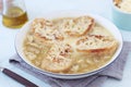 A ceramic bowl with French onion soup Royalty Free Stock Photo