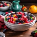 ceramic bowl with fresh summer berries and sweet honey-yogurt.
