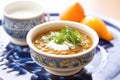 ceramic bowl of lentil soup with a dollop of cream Royalty Free Stock Photo