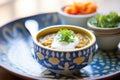 ceramic bowl of lentil soup with a dollop of cream Royalty Free Stock Photo