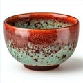 Ceramic bowl with mottled glaze in red and turquoise tones Royalty Free Stock Photo