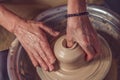 Ceramic bowl on a potter& x27;s wheel, ceramist& x27;s hands. Royalty Free Stock Photo