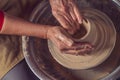 Ceramic bowl on a potter& x27;s wheel, ceramist& x27;s hands. Royalty Free Stock Photo