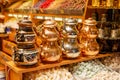 Ceramic bowls with traditional Turkish ornaments are sold at a street market