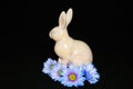 Ceramic bunny with purple and blue daisy