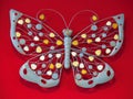 Ceramic Butterfly On Red Background