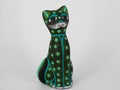 Ceramic cat, hand painted in green
