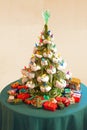 Ceramic Christmas Tree with colorful packages Royalty Free Stock Photo