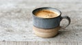 Ceramic Coffee Cup With Frothy Espresso On Rustic Wooden Table. Cozy Morning Beverage Setting Royalty Free Stock Photo