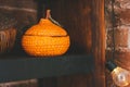 Ceramic container in the shape of a tangerine with a lid covered with glaze