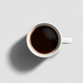 Ceramic cup filled with black coffee is placed on a plain gray Royalty Free Stock Photo