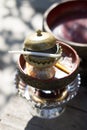 Ceramic cup and holy thread with holy water`s