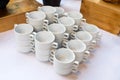 Ceramic cups pile on table