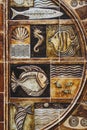 Ceramic decoration in relief with natural patterns