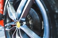 Ceramic disc brakes, car braking system, car detailing at the repair shop Royalty Free Stock Photo