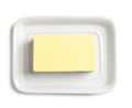 Ceramic dish with block of fresh butter on white background Royalty Free Stock Photo