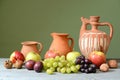 : Ceramic dishes and fresh fruit