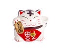 Ceramic doll Japanese welcoming lucky Cat. Maneki Neko :Japanese characters means good luck or fortune Royalty Free Stock Photo