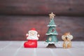 Ceramic doll Santa Claus, Christmas tree and squirrel Royalty Free Stock Photo