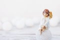 Ceramic figure of angel on light background. Copy spase Royalty Free Stock Photo