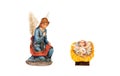 Ceramic figure of The Baby Jesus and the angel of the nativity scene Royalty Free Stock Photo