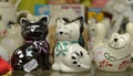 Ceramic figures of cats in a store