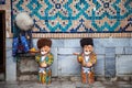 Ceramic figures of Uzbek old men in traditional clothes. Uzbekistan