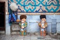 Ceramic figures of Uzbek old men in traditional clothes. Uzbekistan