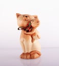 Ceramic figurine cat on white background Royalty Free Stock Photo