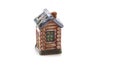 Ceramic figurine for spices in the form of house-hut isolated on