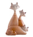 Ceramic figurines of the cats isolated on white