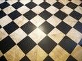 The ceramic floor is tiled in a checkerboard pattern Royalty Free Stock Photo