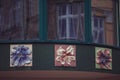 Ceramic flowers on the facade of a store in the city of Przemyl, Eastern Europe, Poland