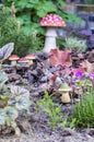 Ceramic garden Mushrooms in the flower garden