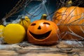 Halloween composition with ceramic Jack Lantern pumpkins and gym dumbbells. Royalty Free Stock Photo