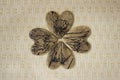 Ceramic hearts made of clay with imprints of plants lie on a beige background. handmade. love symbol and valentine`s day