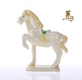 Ceramic horse souvenir on old paper Royalty Free Stock Photo