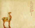 Ceramic horse souvenir on old paper Royalty Free Stock Photo