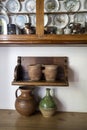 Ceramic jugs, milk jars in a vintage kitchen