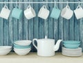 Ceramic kitchenware on the shelf. Royalty Free Stock Photo