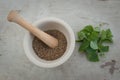 Ceramic mortar with mint and anise