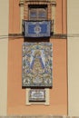 Ceramic mosaic icons on the wall of a building, Valencia, Spain Royalty Free Stock Photo