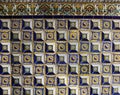 Ceramic mosaic pattern.Colorful floral background. Ceramic mosaic close up. Andalusian ceramic wall. Dirty floral wall fragment ph