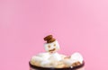 Ceramic mug with hot fresh cocoa drink and melted handmade marshmallow snowman Royalty Free Stock Photo